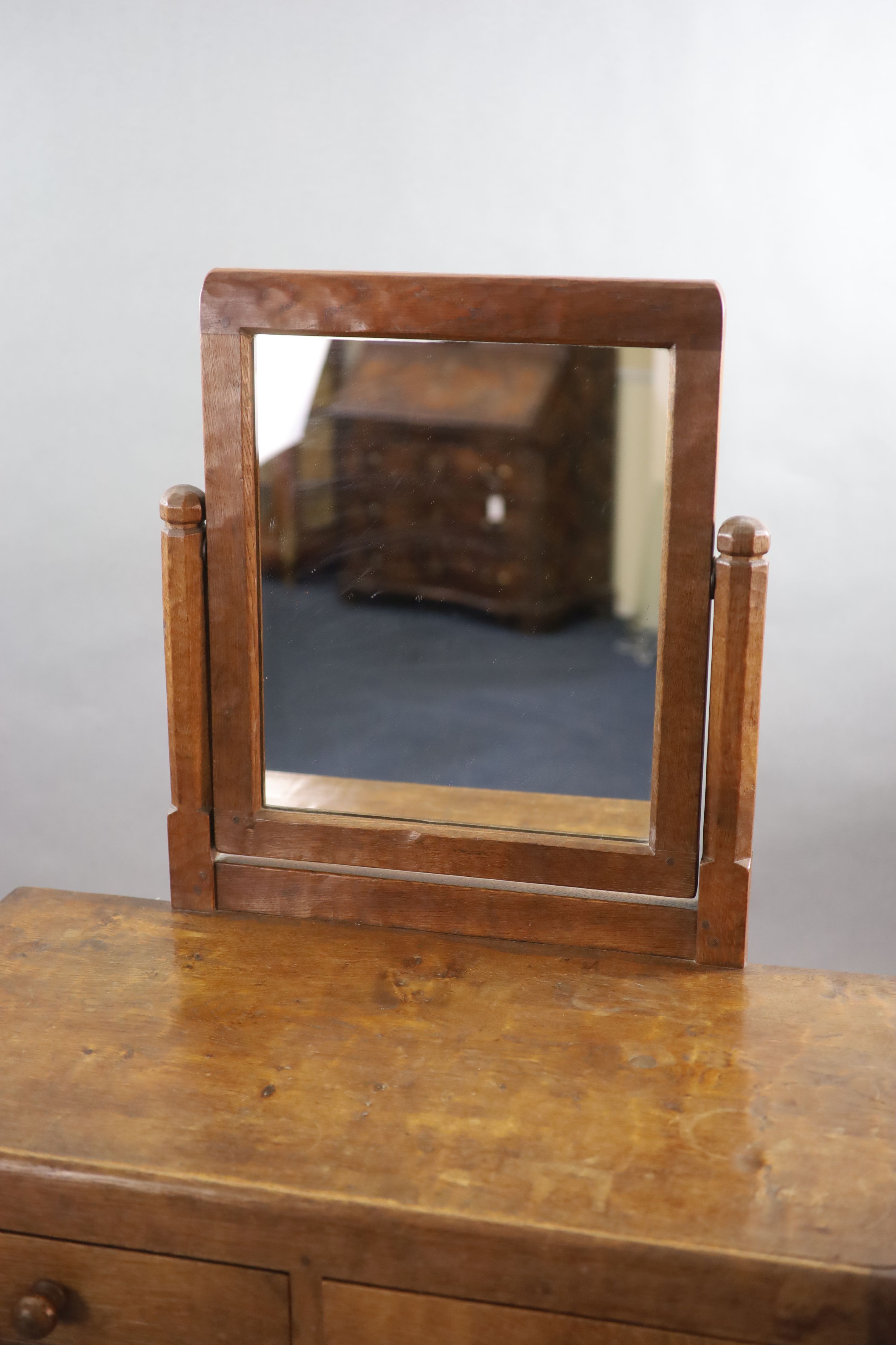 A Robert Thompson Mouseman oak dressing chest, W.91cm D.46cm H.152cm